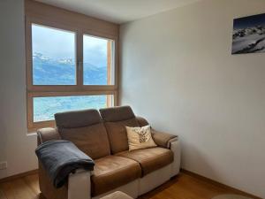 Posezení v ubytování Apartment in Veysonnaz near Ski Lift