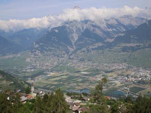 a view of a city with a mountain at Studio in Veysonnaz near Ski Lift in Veysonnaz
