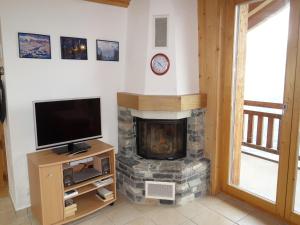 Televisyen dan/atau pusat hiburan di Apartment in Veysonnaz near Ski Lift