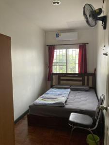 Postel nebo postele na pokoji v ubytování KingSun HOSTEL 金珊旅馆