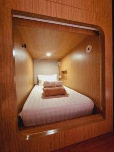 Ένα ή περισσότερα κρεβάτια σε δωμάτιο στο Moonstar Cebu Hotel