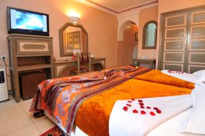 Postel nebo postele na pokoji v ubytování Diwane Hotel & Spa Marrakech
