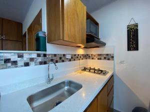 Η κουζίνα ή μικρή κουζίνα στο Horus Loft - Con Terraza en todo el Centro