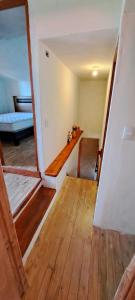 Postel nebo postele na pokoji v ubytování Casa el arenal-Lago Ranco