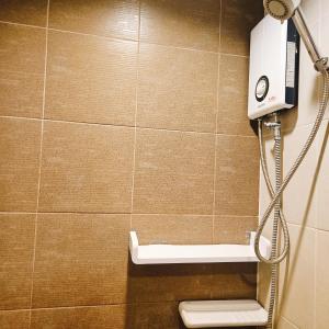 a bathroom with a shower and a toilet in a room at 2BR - MRT Lak Song 5 Minute - Garden-Gym-Pool-wifi in Ban Khlong Khwang Klang