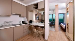 A kitchen or kitchenette at Somerset Maslak Istanbul