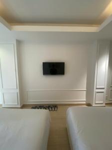 TV a/nebo společenská místnost v ubytování TwoLand Hotels & Spa