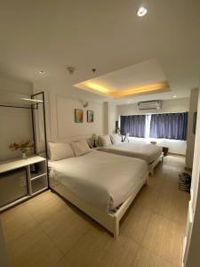 Postel nebo postele na pokoji v ubytování TwoLand Hotels & Spa