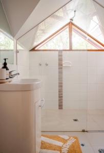 a bathroom with a shower and a sink at Bickley Tree Stay in Bickley +42 photos