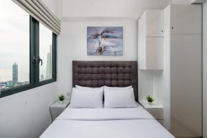 Postel nebo postele na pokoji v ubytování La Privé Apartments TRI-ZEN