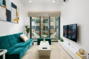 TV a/nebo společenská místnost v ubytování La Privé Apartments TRI-ZEN