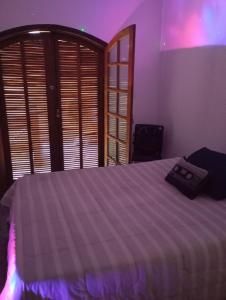 Cama ou camas em um quarto em Quarto Privativo a 10 Min do Aeroporto GRU I mais 21 fotos
