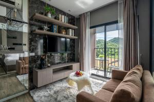 Mountain-view 1BR 9F Sriracha byน้องมังคุด NoParking的休息区