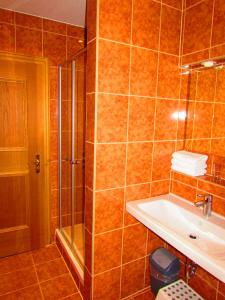 Ein Badezimmer in der Unterkunft Gästehaus Gritscher
