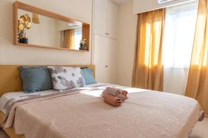 Postel nebo postele na pokoji v ubytování Elysia Park pool view apartment + 34 fotografií