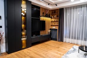 Kuchyň nebo kuchyňský kout v ubytování Brilijant Lux Apartman