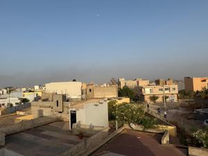 a view of a city with buildings at Super Studio avec Jacuzzi à Diamniadio in Déni Diarke