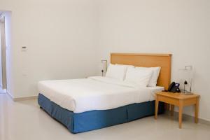 Assia Hotel客房内的一张或多张床位