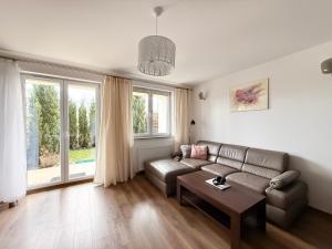 Posedenie v ubytovaní APARTAMENT POD GWIAZDAMI, z dwoma ogródkami i dwoma tarasami