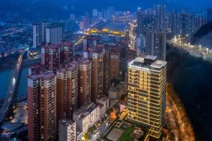 an overhead view of a city at night at Wyndham Garden Xunyang Downtown in Xunyang