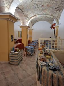 Posezení v ubytování Hotel 4 Mori