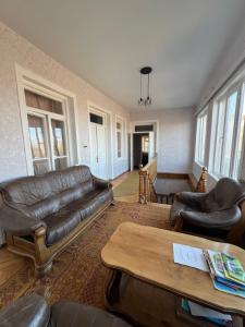 Ruang duduk di GuestHouse LILIA &Wine Celler