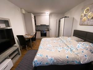 Postel nebo postele na pokoji v ubytování Aparthotel work&sleep + 6 fotografií