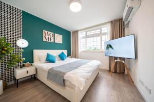 Postel nebo postele na pokoji v ubytování 柃居 B&B - People's Square Branch