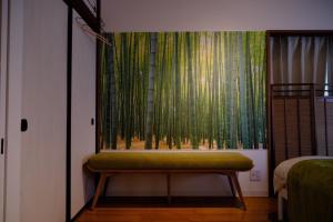 a room with a bench in front of a window at Mori no Kabe Tokyo #KT1 in Takahate +41 photos