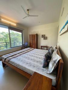 Bodi Villa- Mountain view with pool客房内的一张或多张床位