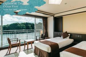 Postel nebo postele na pokoji v ubytování KAMENOI HOTEL Kii-Tanabe