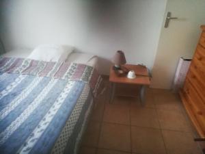 Postel nebo postele na pokoji v ubytování location d'une chambre au calme dans un appartement