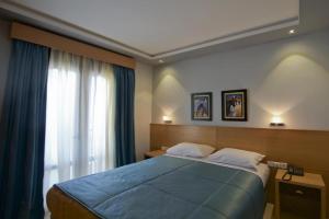 Voodi või voodid majutusasutuse Hotel Al amal Tiznit toas