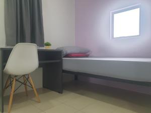 Photo de la galerie de l'établissement Unisuites Roomstay, à Kampar
