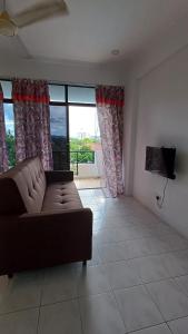 TV a/nebo společenská místnost v ubytování EasyStay Langkawi Apartment