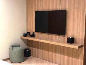 TV a/nebo společenská místnost v ubytování Resident Hotel Abay