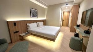 TV a/nebo společenská místnost v ubytování Resident Hotel Abay