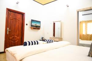 Postel nebo postele na pokoji v ubytování Sea View Villa Ukulhas