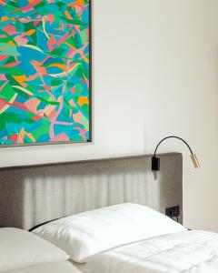 Postel nebo postele na pokoji v ubytování Lendhotel