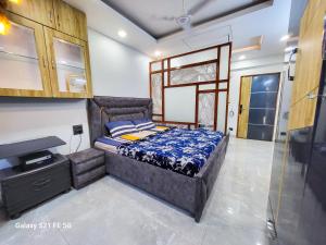 Fotografie z fotogalerie ubytování VacationBuddy Superb Furnished Studio Apartment 720 in West Delhi v Novém Dillí