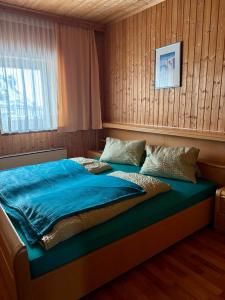Postel nebo postele na pokoji v ubytování Leiterhütte
