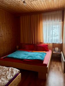 Postel nebo postele na pokoji v ubytování Leiterhütte