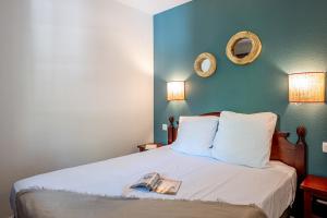 Ein Bett oder Betten in einem Zimmer der Unterkunft Résidence Pierre & Vacances Le Domaine de Gascogne