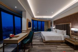 Sarovar Portico Ajmer客房内的一张或多张床位