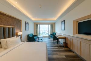 Sarovar Portico Ajmer客房内的一张或多张床位