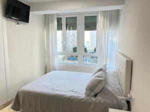 Posteľ alebo postele v izbe v ubytovaní Rentaly Holidays Apartamento Playa Almeria