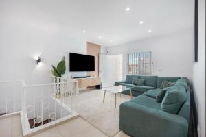 Μια τηλεόραση ή/και κέντρο ψυχαγωγίας στο Atico castelar by Staycare