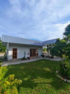 Zahrada ubytování Chiang Khan Dwelling + 17 fotografií