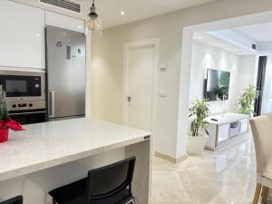 Kuchyňa alebo kuchynka v ubytovaní Rentaly Holidays Apartamento Playa Almeria