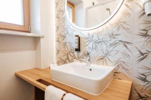 Koupelna v ubytování Hotel Tannenhof + 24 fotografií